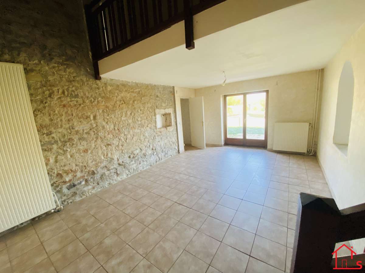 APPARTEMENT EN DUPLEX AVEC JARDIN