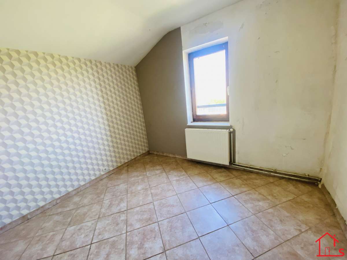 APPARTEMENT EN DUPLEX AVEC JARDIN