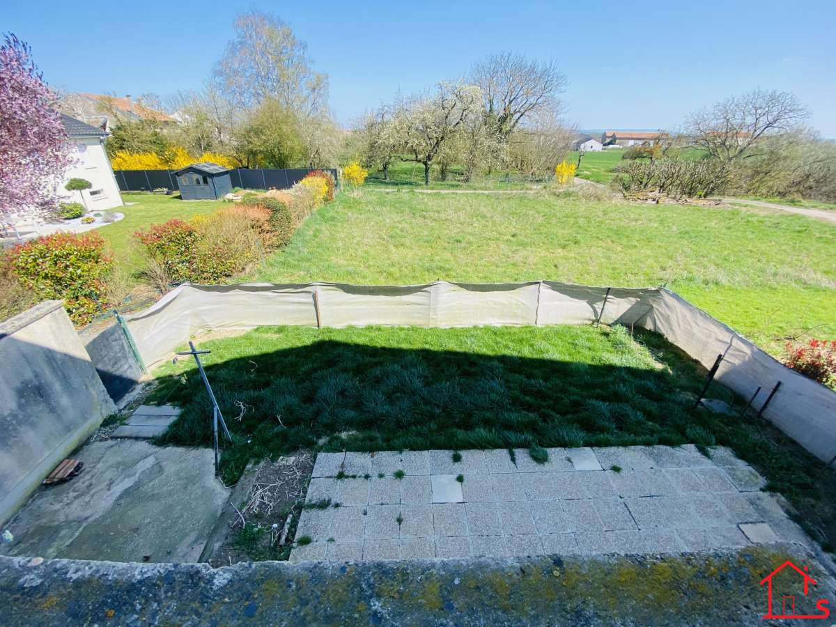 APPARTEMENT EN DUPLEX AVEC JARDIN