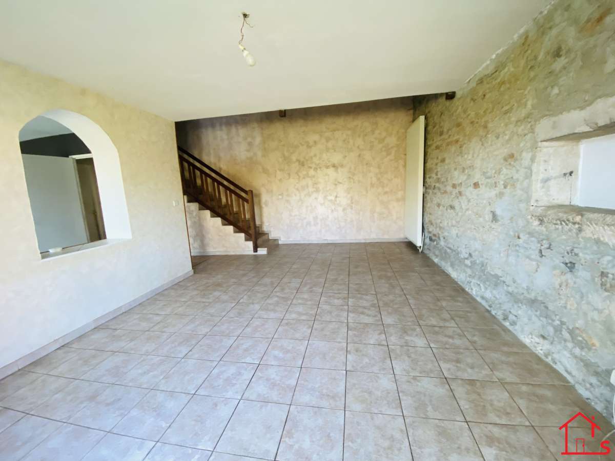 APPARTEMENT EN DUPLEX AVEC JARDIN