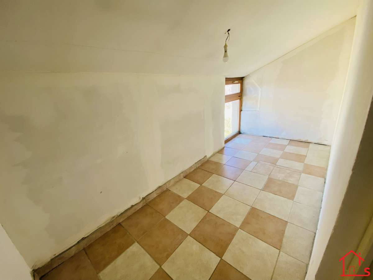 APPARTEMENT EN DUPLEX AVEC JARDIN