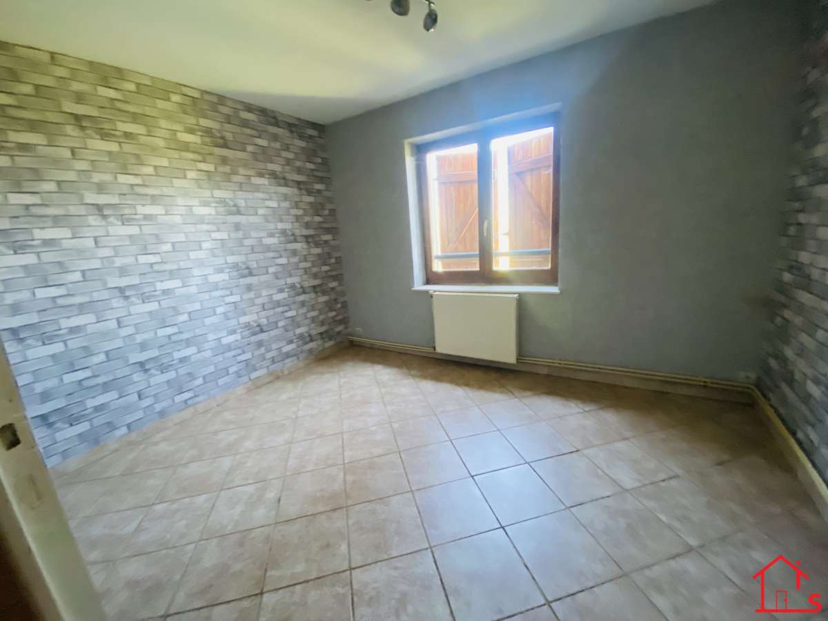 APPARTEMENT EN DUPLEX AVEC JARDIN