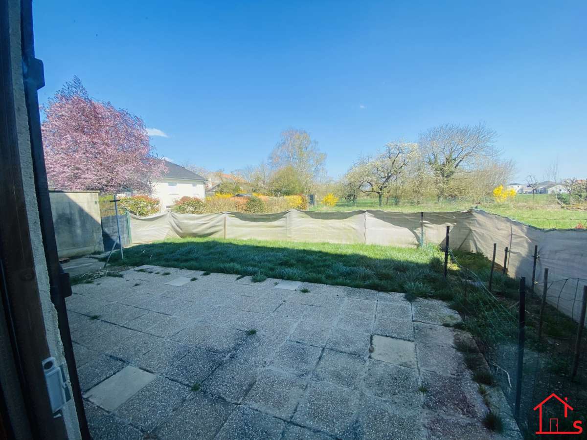 APPARTEMENT EN DUPLEX AVEC JARDIN