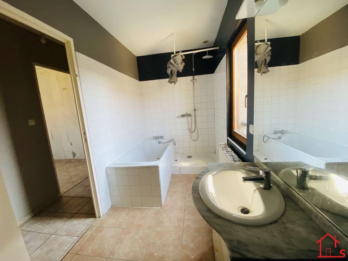 APPARTEMENT EN DUPLEX AVEC JARDIN