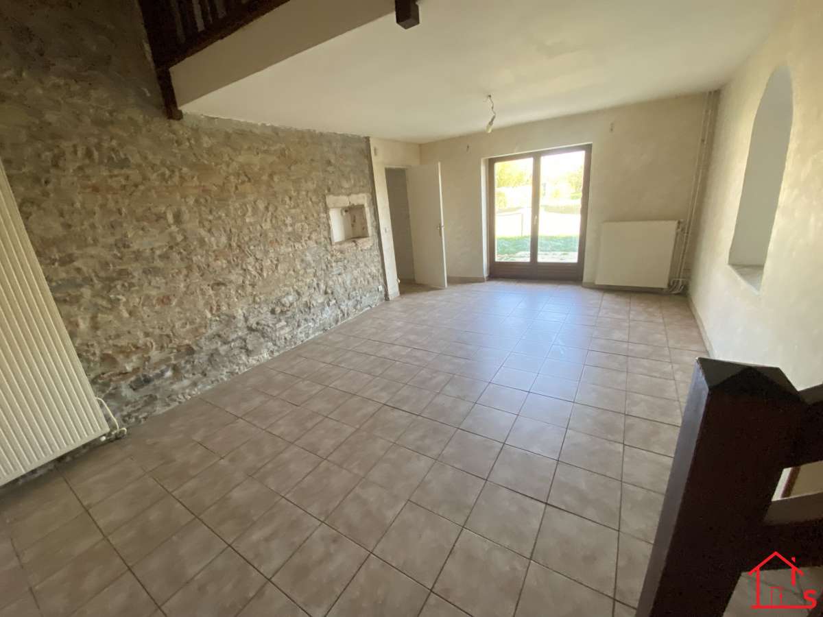 APPARTEMENT EN DUPLEX AVEC JARDIN