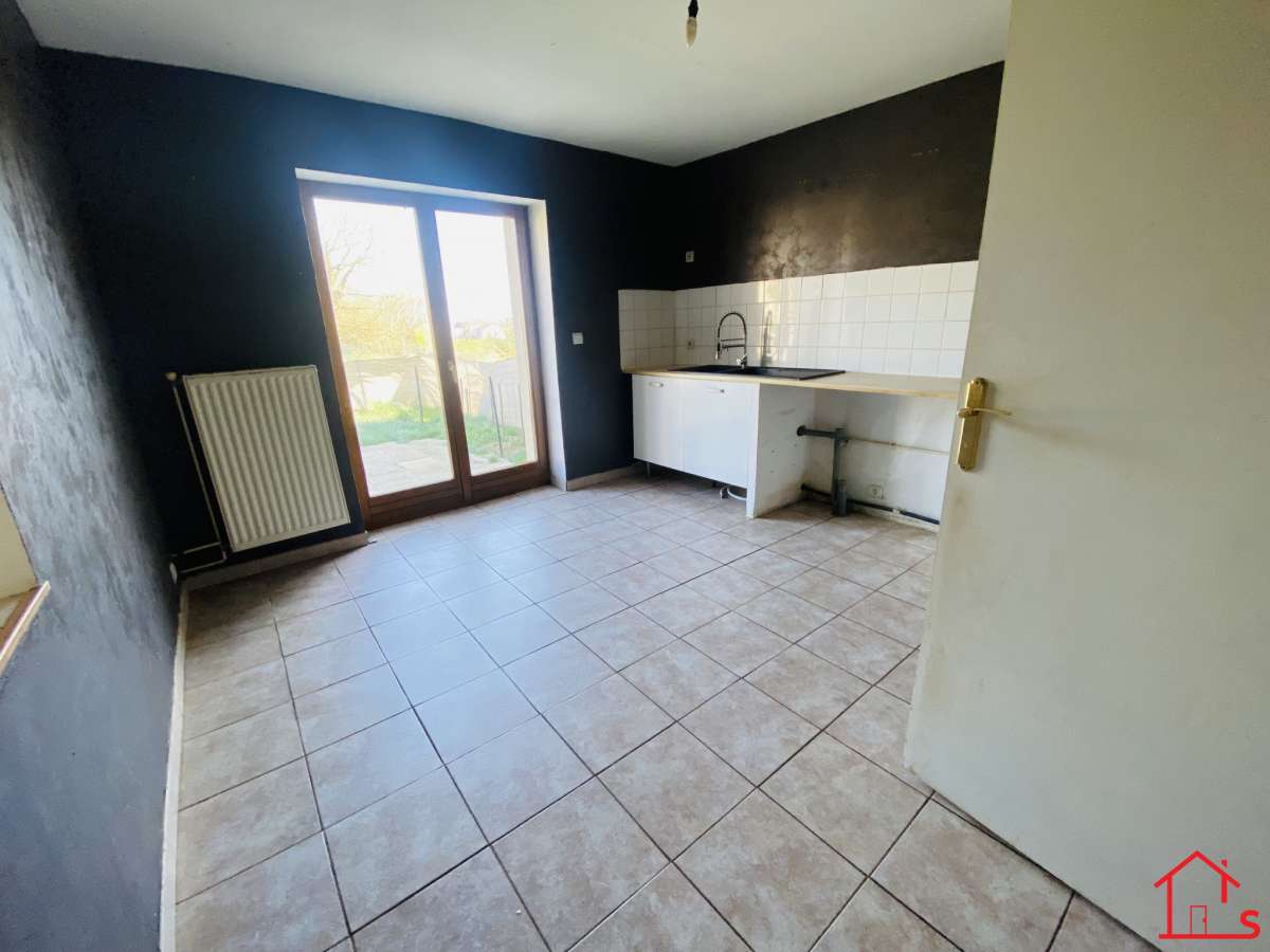 APPARTEMENT EN DUPLEX AVEC JARDIN